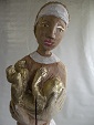 Frau mit goldenem Kind